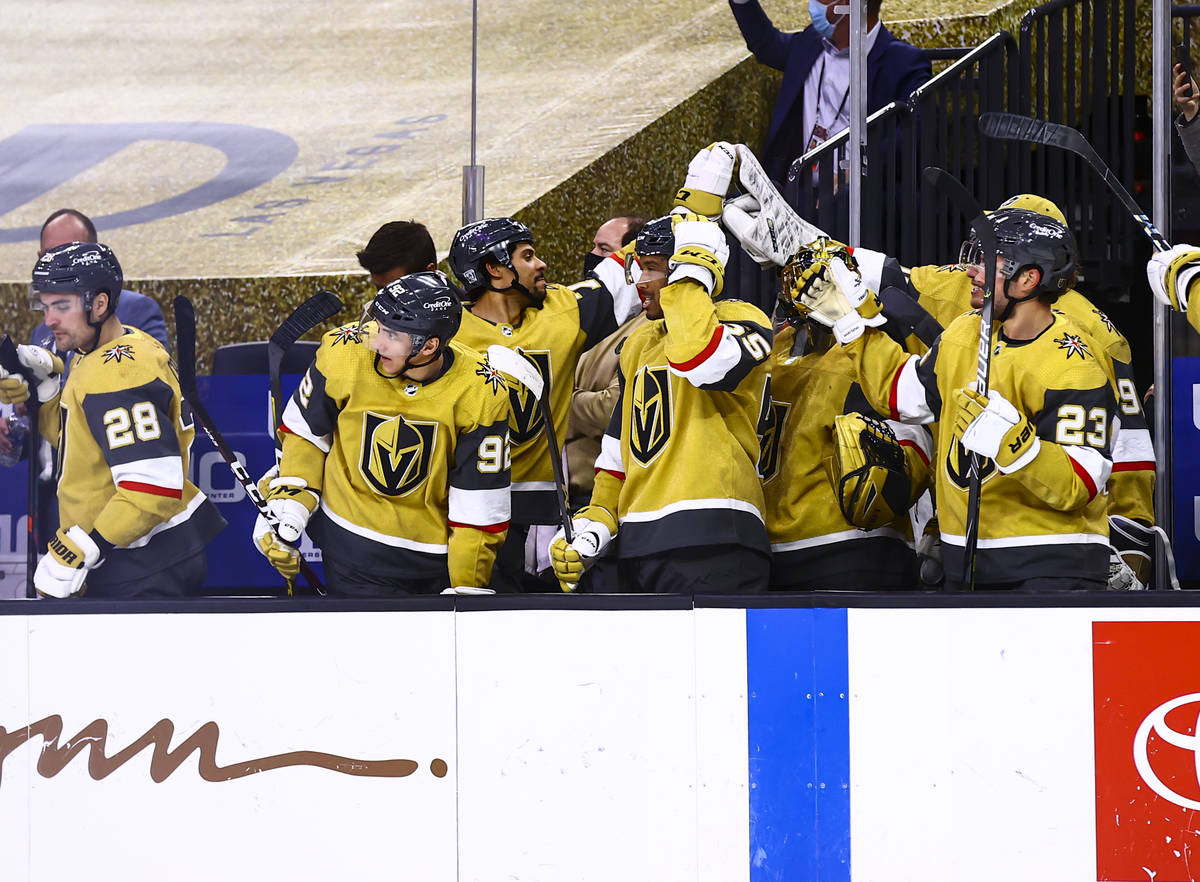 The Golden Knights celebrate a goal by center William Karlsson, not pictured, during the third ...