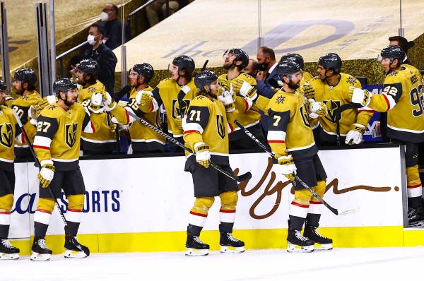 The Golden Knights celebrate a goal by center William Karlsson (71) during the third period of ...