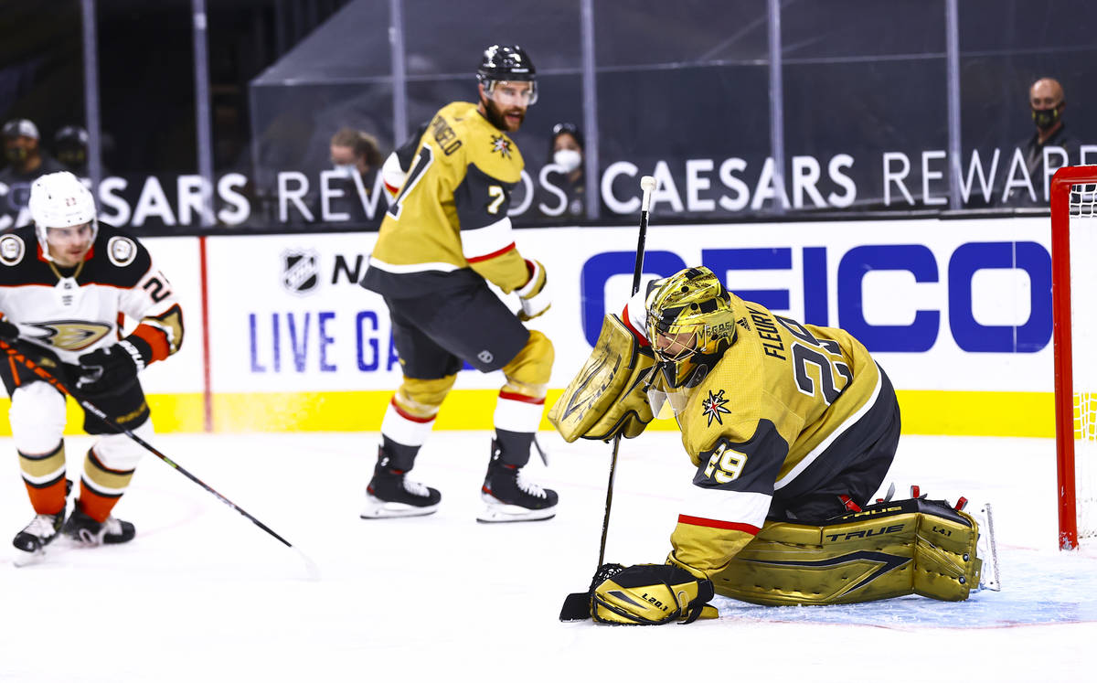 Golden Knights goaltender Marc-Andre Fleury (29) stops the puck during the third period of an N ...