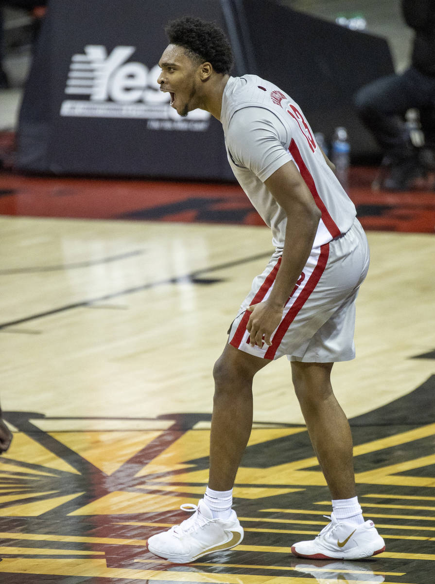 UNLV Rebels guard Bryce Hamilton (13) yells after another big basket over the New Mexico Lobos ...