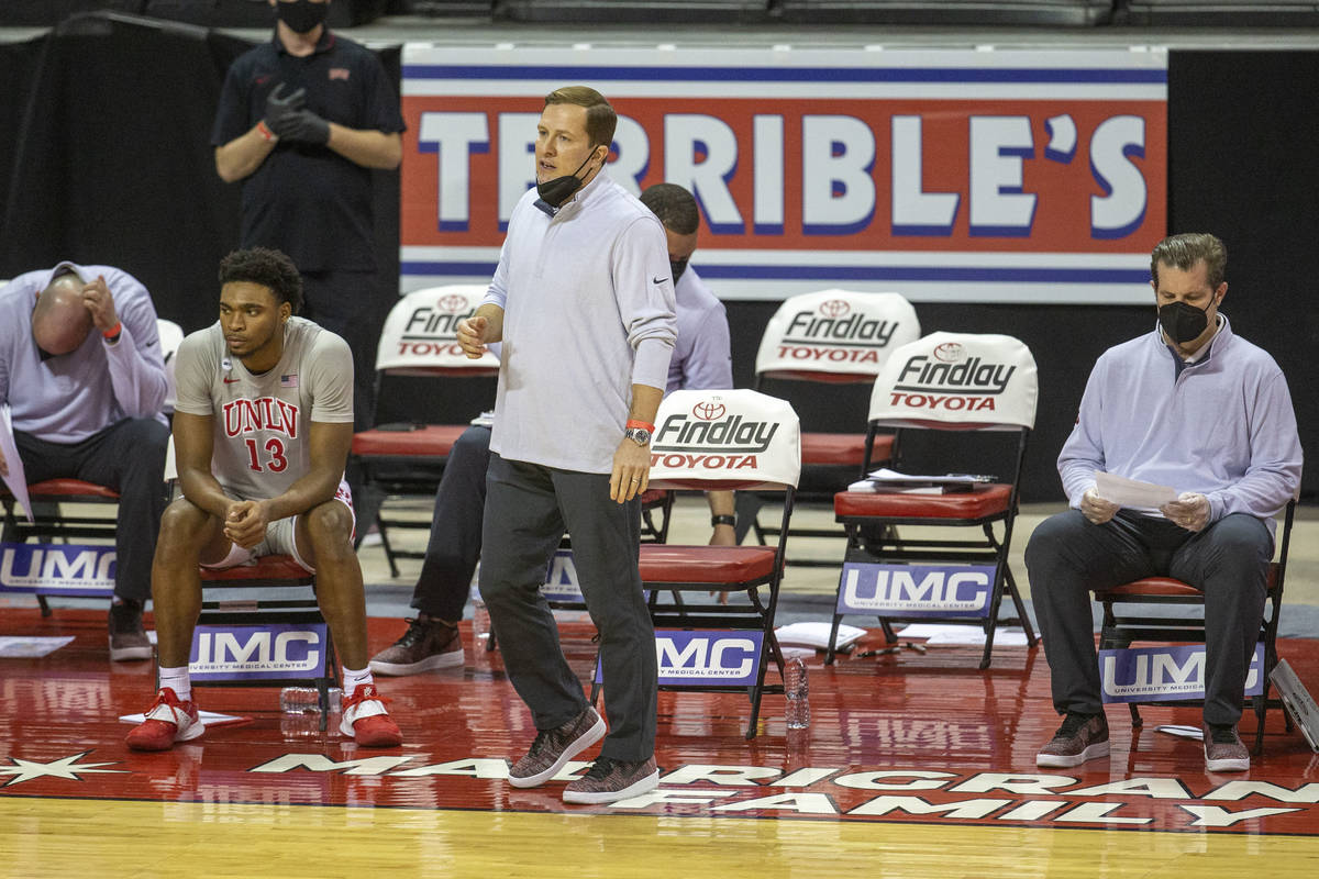 UNLV Rebels head coach T.J. Otzelberger coaches during the first half of an NCAA men's basketba ...
