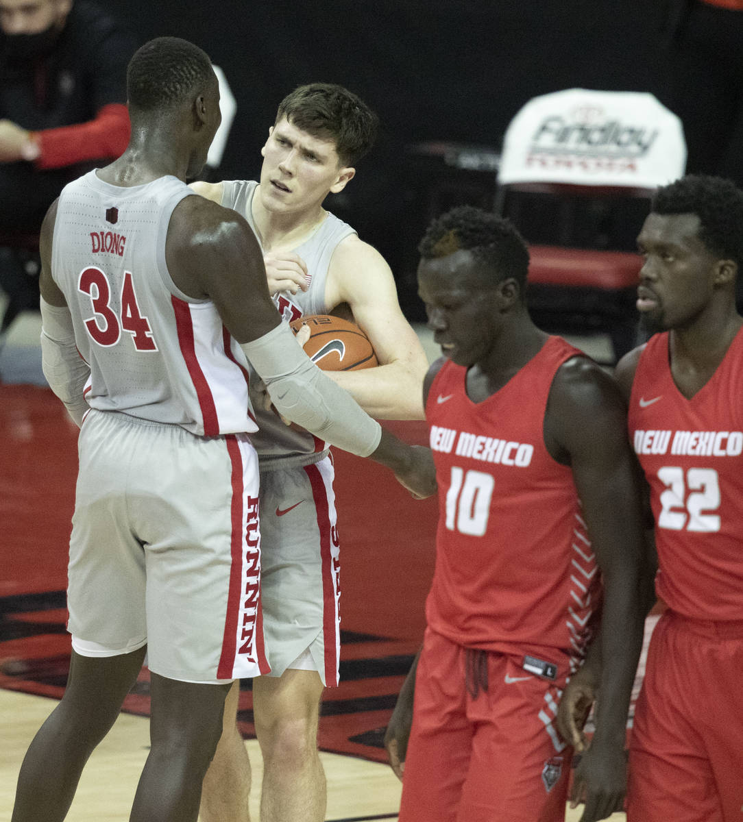 UNLV Rebels forward Moses Wood (1) is congratulated by forward Mbacke Diong (34) for drawing a ...