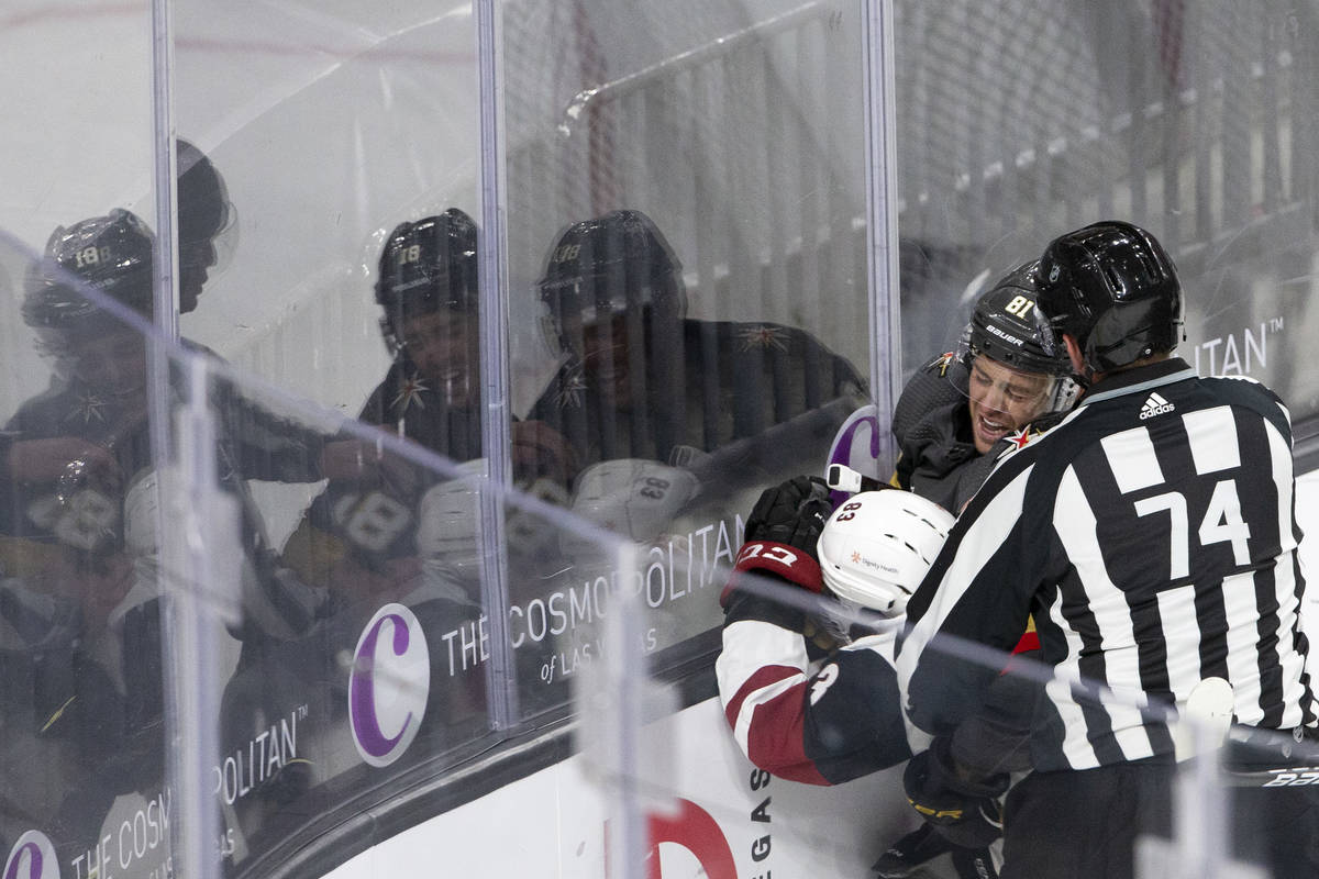 Golden Knights' center Jonathan Marchessault (81) gets in a fight with Arizona Coyotes' right w ...