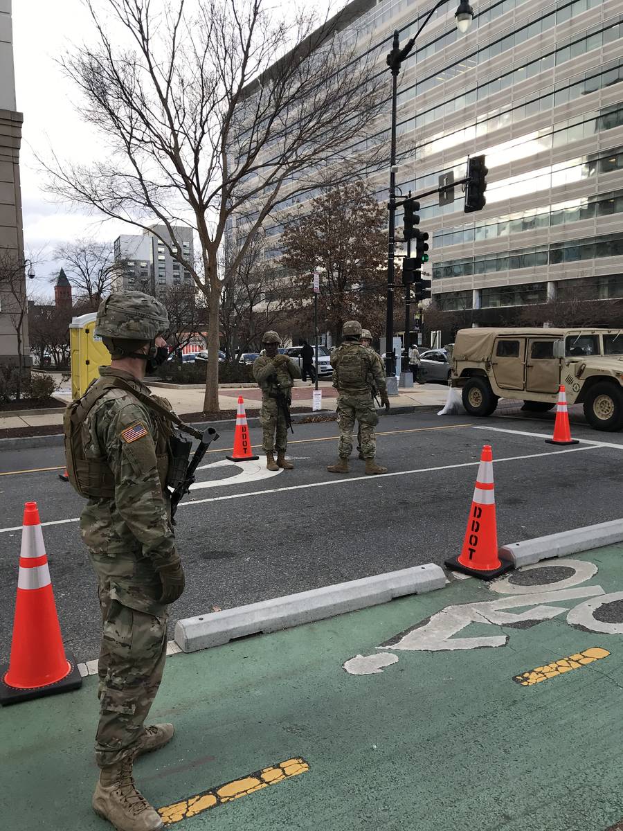 National Guard soldiers from Pennsylvania man a checkpoint in Washington, D.C. on Jan. 19, 2021 ...