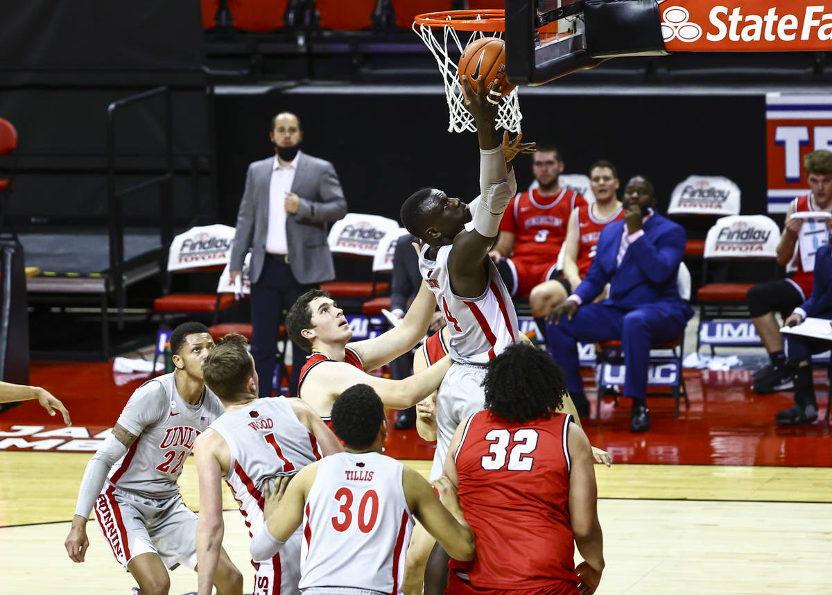 UNLV Rebels forward Cheikh Mbacke Diong (34) goes to the basket against the Benedictine Mesa Re ...