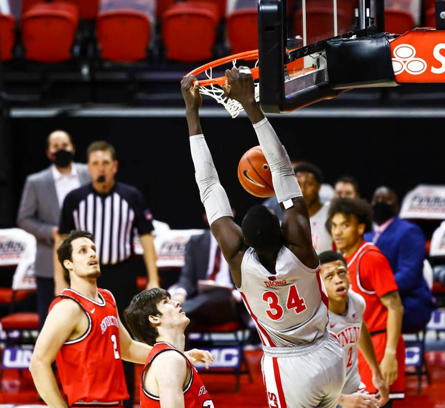 UNLV Rebels forward Cheikh Mbacke Diong (34) dunks the ball against the Benedictine Mesa Redhaw ...