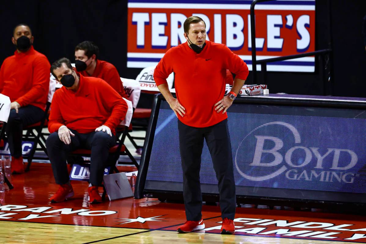 UNLV Rebels head coach T.J. Otzelberger looks on during the first half of a basketball game aga ...