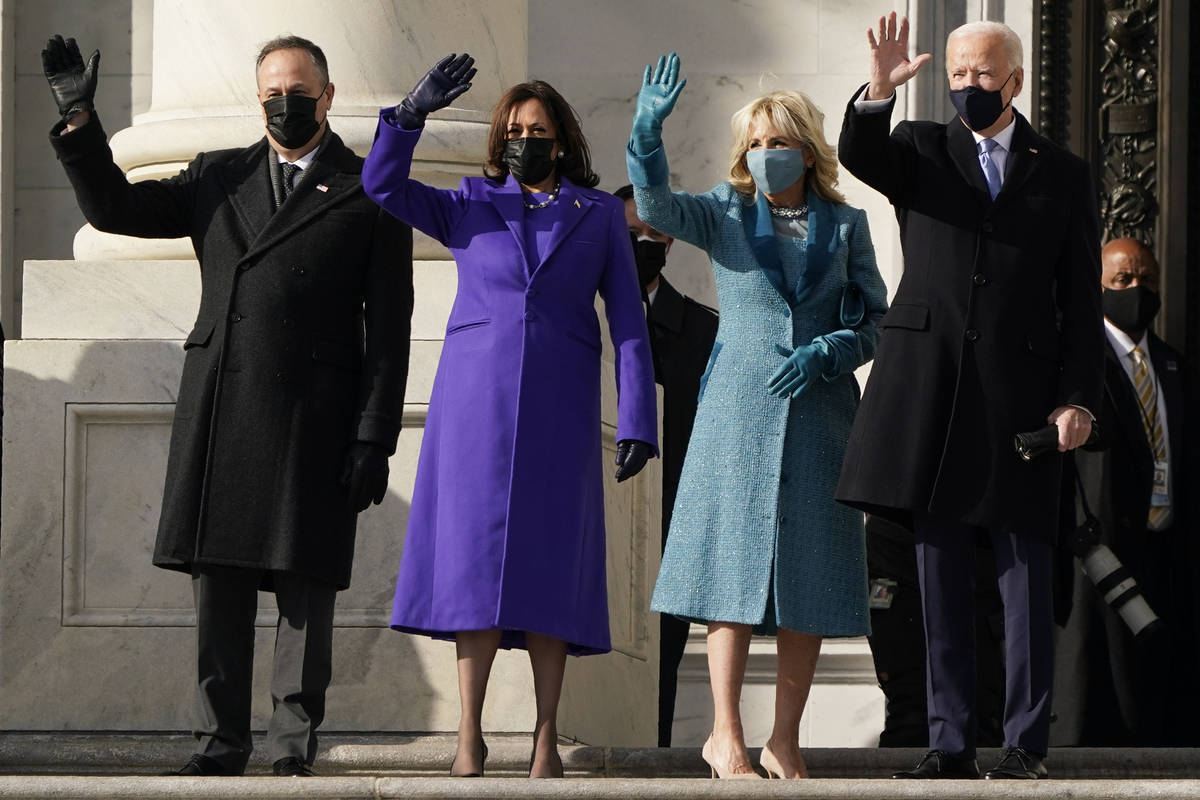 President-elect Joe Biden, his wife Jill Biden and Vice President-elect Kamala Harris and her h ...