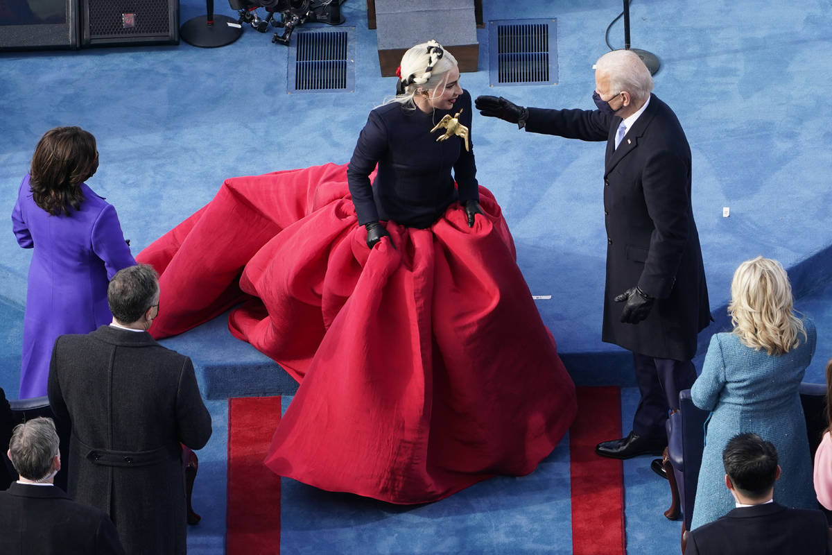 President-elect Joe Biden greets Lady Gaga during the 59th Presidential Inauguration at the U.S ...