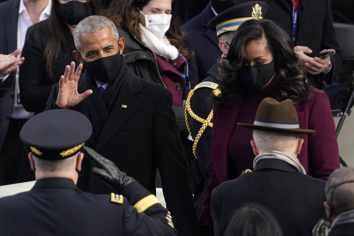 Former President Barack Obama and his wife Michelle arrive for the 59th Presidential Inaugurati ...