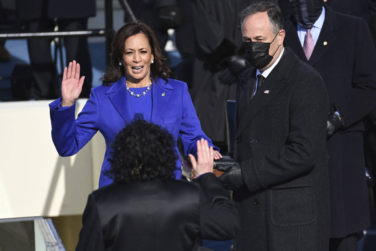 Kamala Harris is sworn in as vice president by Supreme Court Justice Sonia Sotomayor as her hus ...