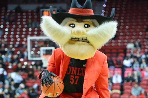 Hey Reb! dribbles the ball before the UNLV Rebels and the New Mexico Lobos NCAA basketball game ...