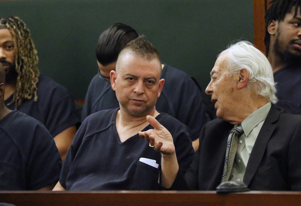 Bill Terry, right, talks to Christopher Prestipino in court on March 12, 2020. Prestipino was a ...