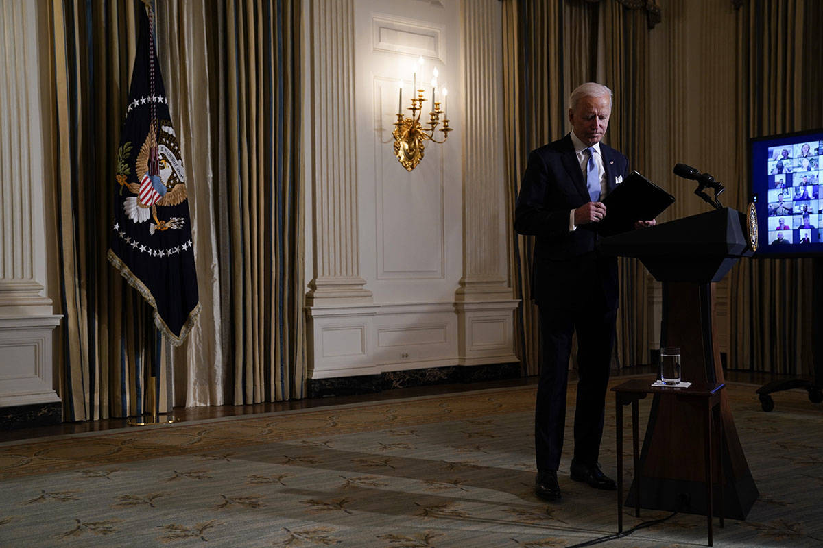 President Joe Biden leaves after attending a virtual swearing in ceremony of political appointe ...