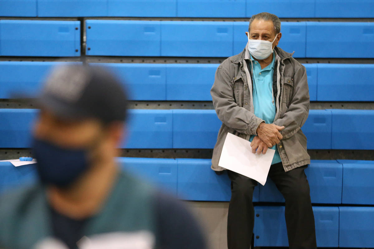 Richard Martinez, 73, is monitored after receiving the COVID-19 vaccine at the Neighborhood Rec ...