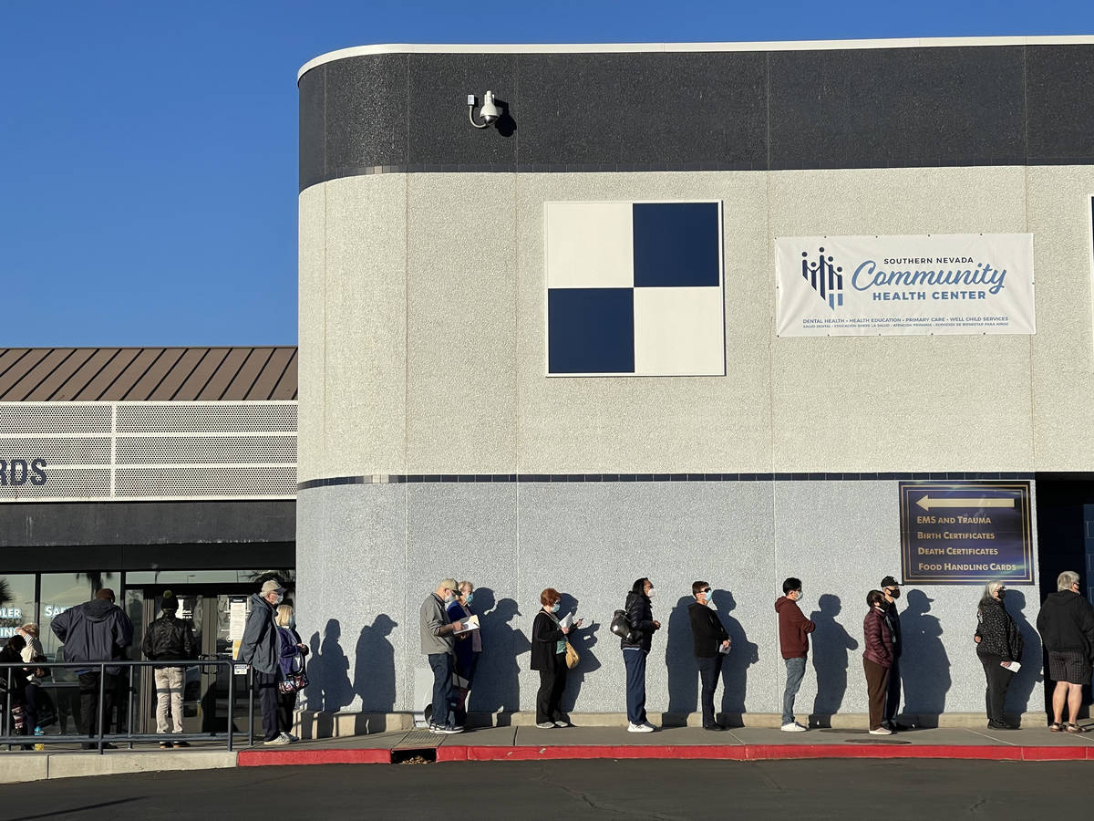 People line up for COVID-19 vaccinations at the Southern Nevada Health District in Las Vegas Th ...
