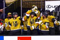 The Golden Knights celebrate a goal by right wing Alex Tuch, not pictured, during the third per ...
