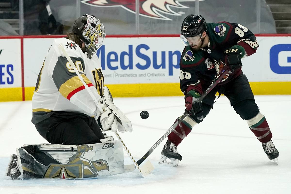 Vegas Golden Knights goaltender Robin Lehner (90) makes a save on a shot by Arizona Coyotes rig ...