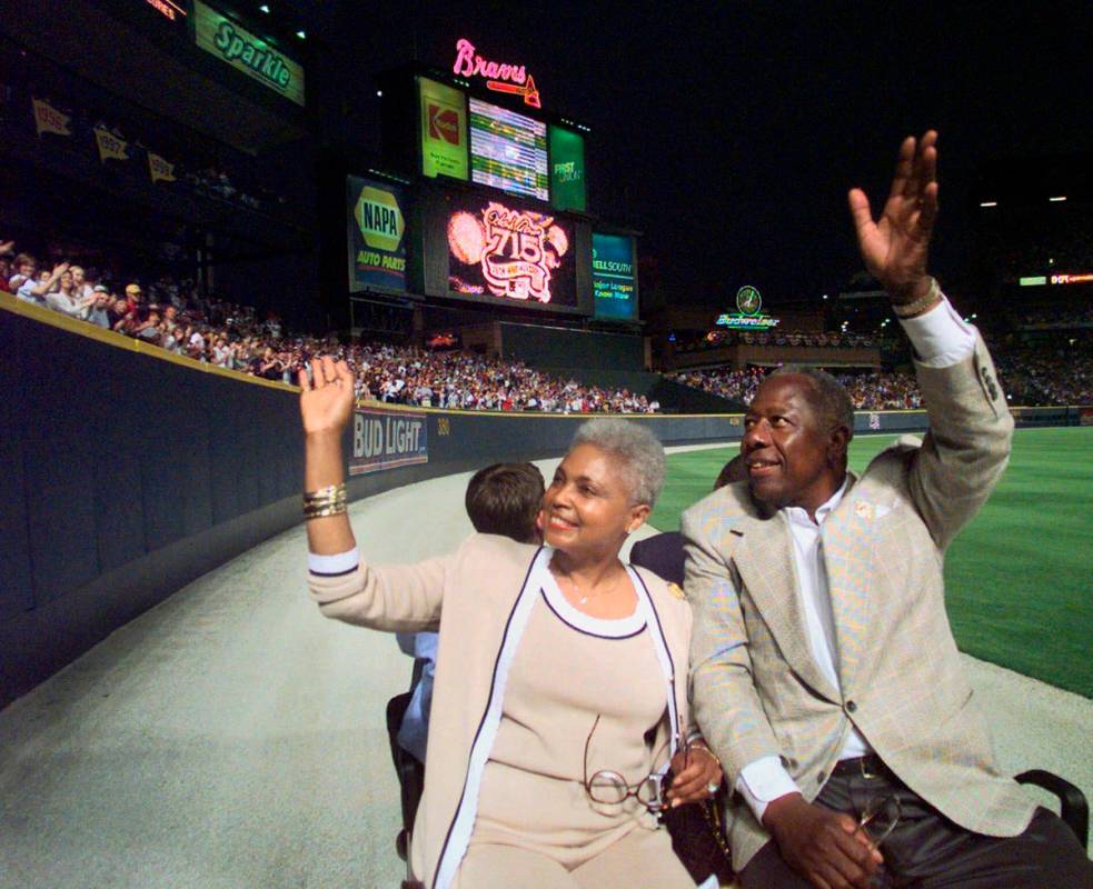 Major League Baseball's all-time career home run record holder Hank Aaron and his wife Billye t ...