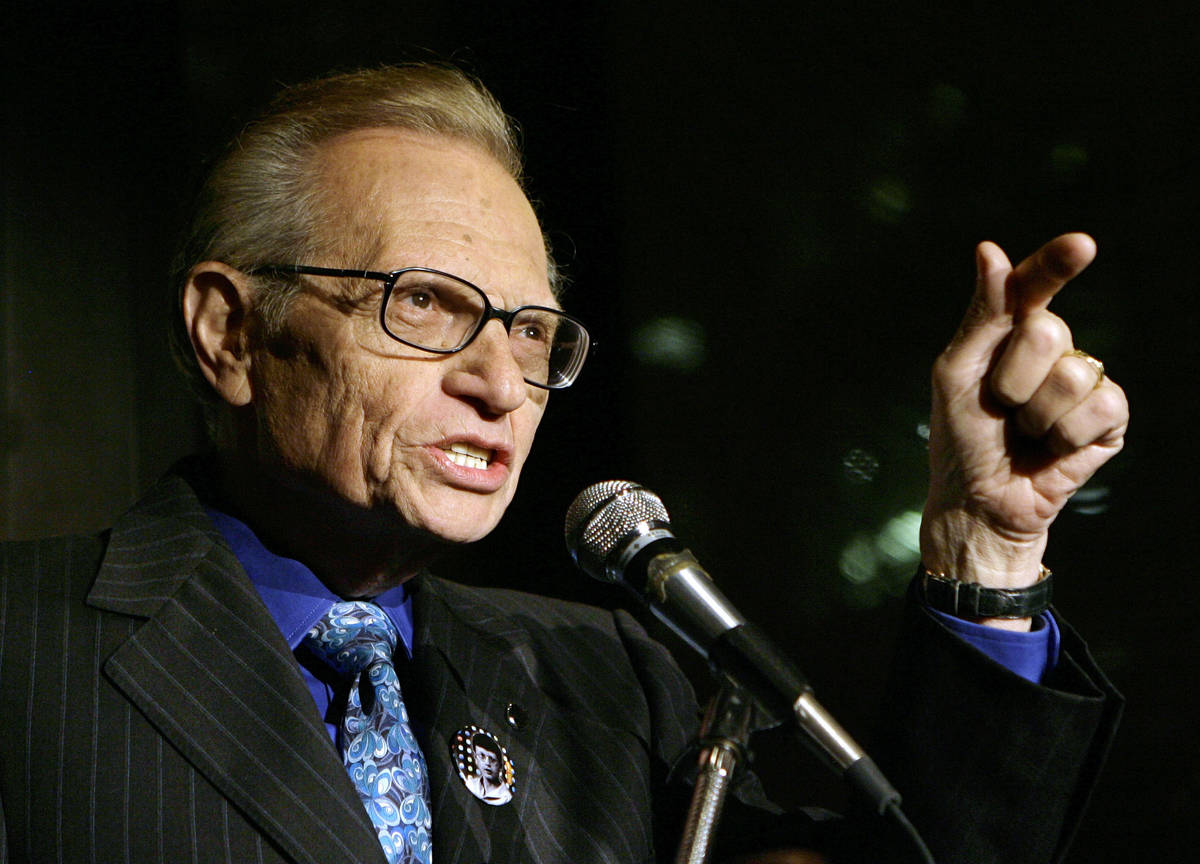 FILE - In this April 18, 2007 file photo, Larry King speaks to guests at a party held by CNN, c ...