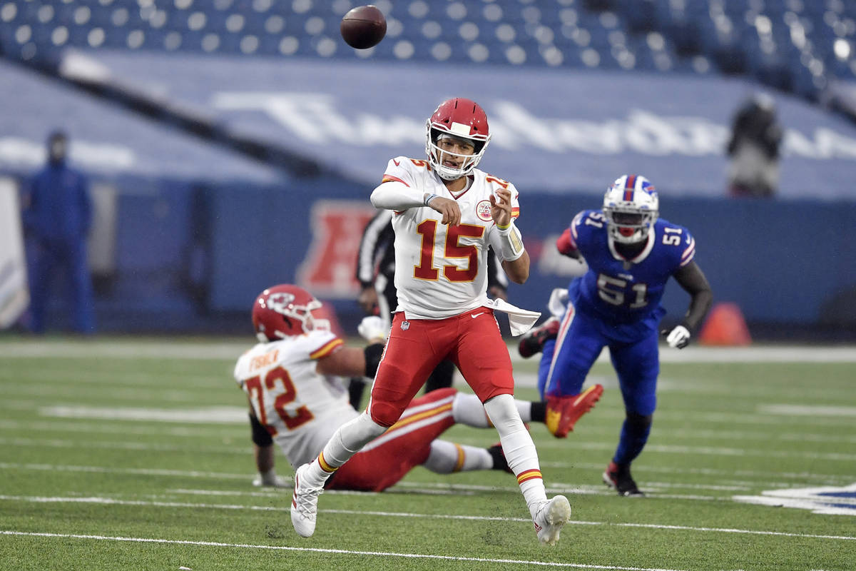 Kansas City Chiefs quarterback Patrick Mahomes throws a pass during the first half of an NFL fo ...