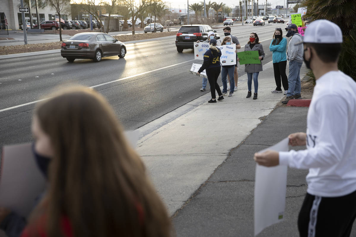 People protest Clark County School District's decision to cancel winter and fall sports seasons ...