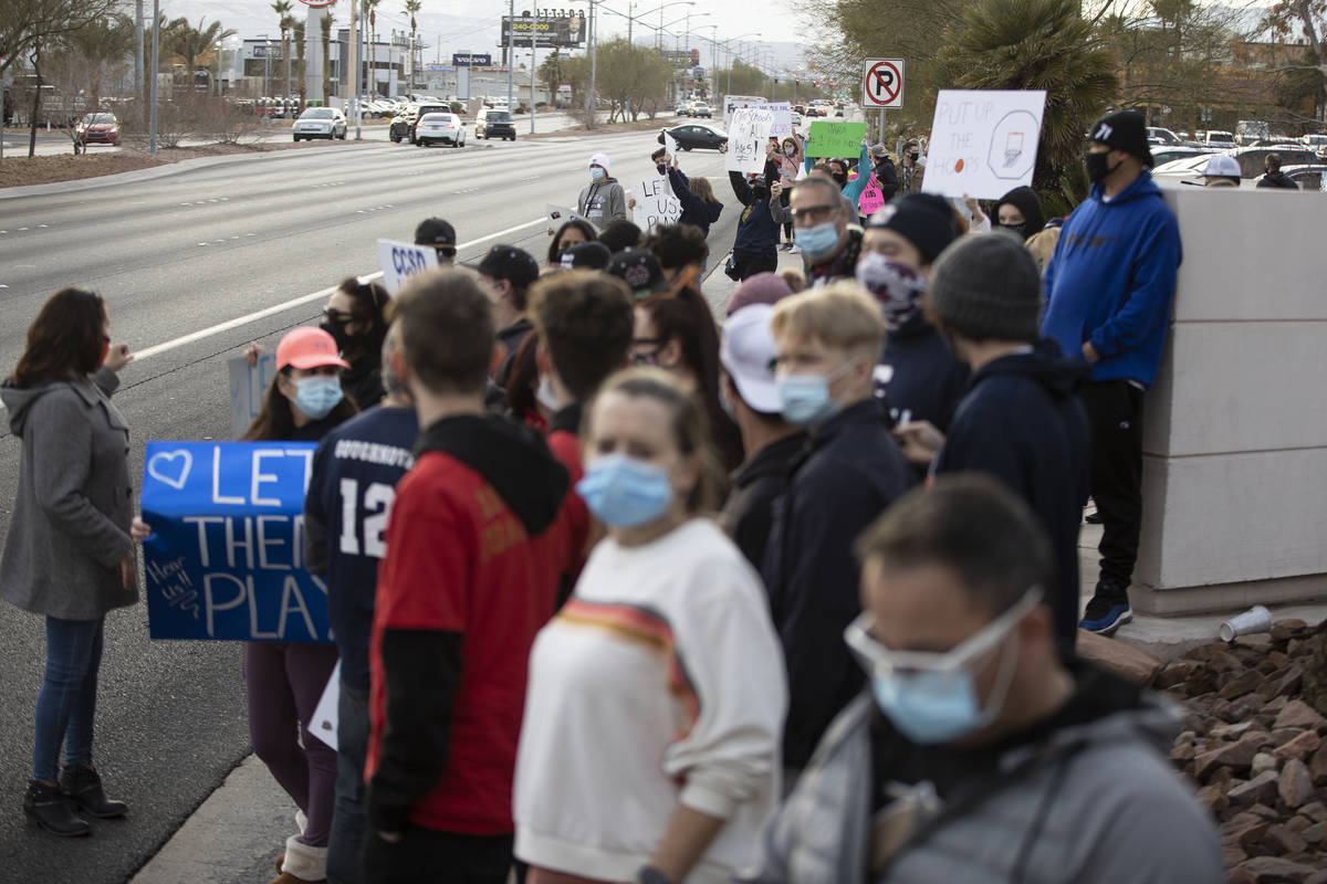 People protest Clark County School District's decision to cancel winter and fall sports seasons ...