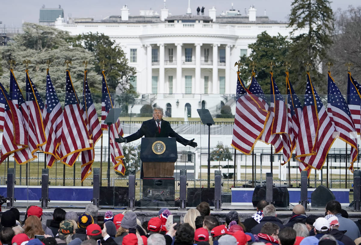 FILE - In this Jan. 6, 2021, file photo with the White House in the background, President Donal ...