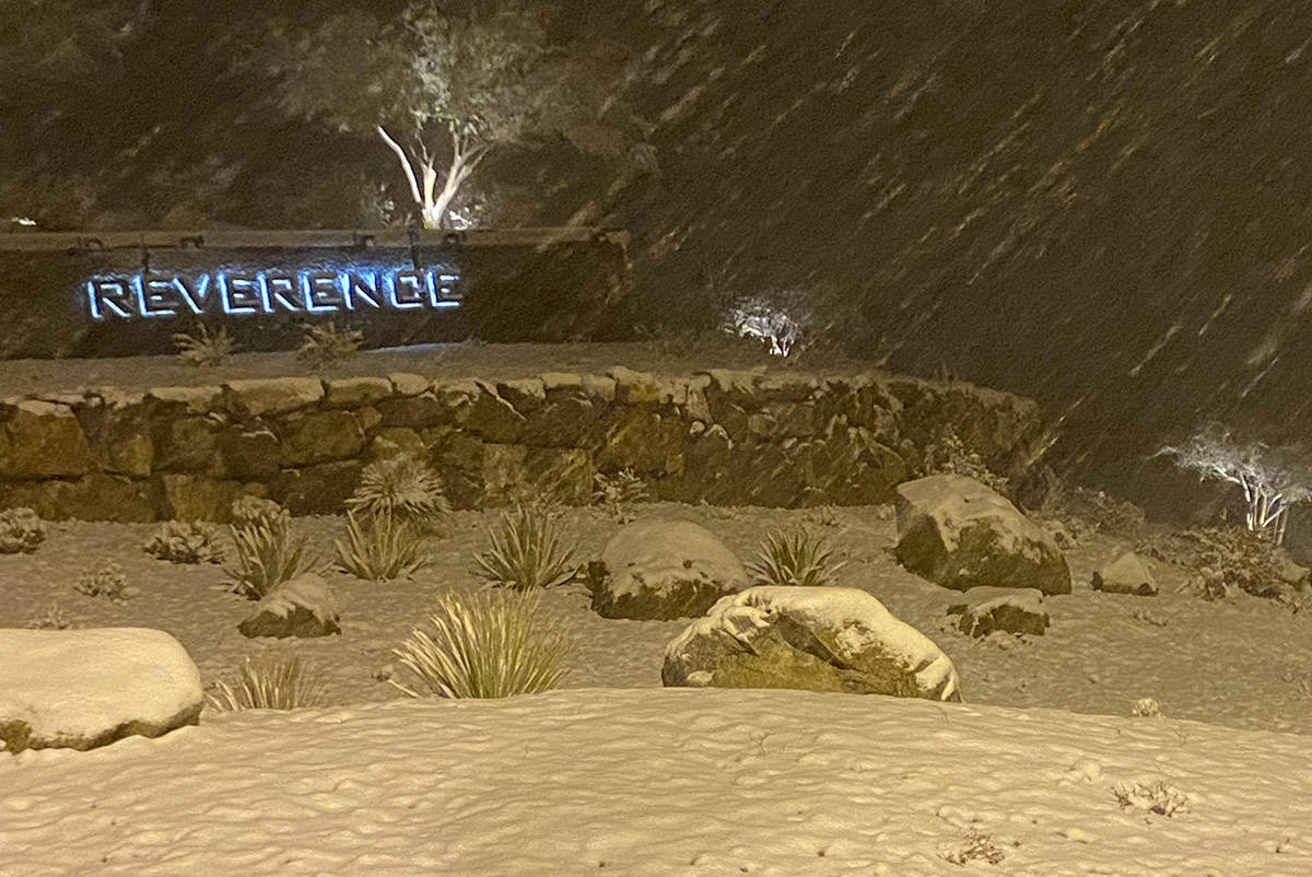 Snow covers portions of the entrance to Reverence subdivision at West Lake Mead at the 215 Belt ...