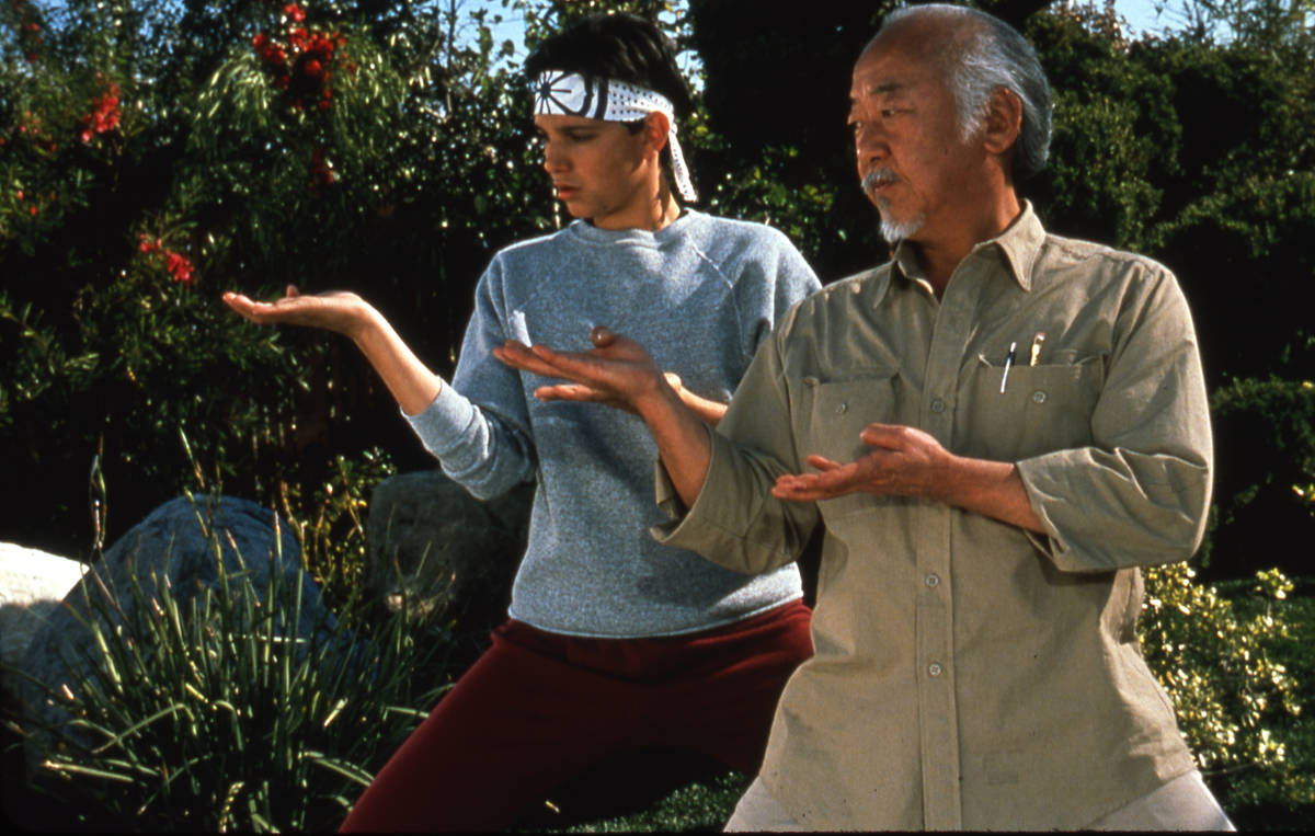 Ralph Macchio, left, and Pat Morita in a scene from "The Karate Kid." (Sony Pictures Entertainment)