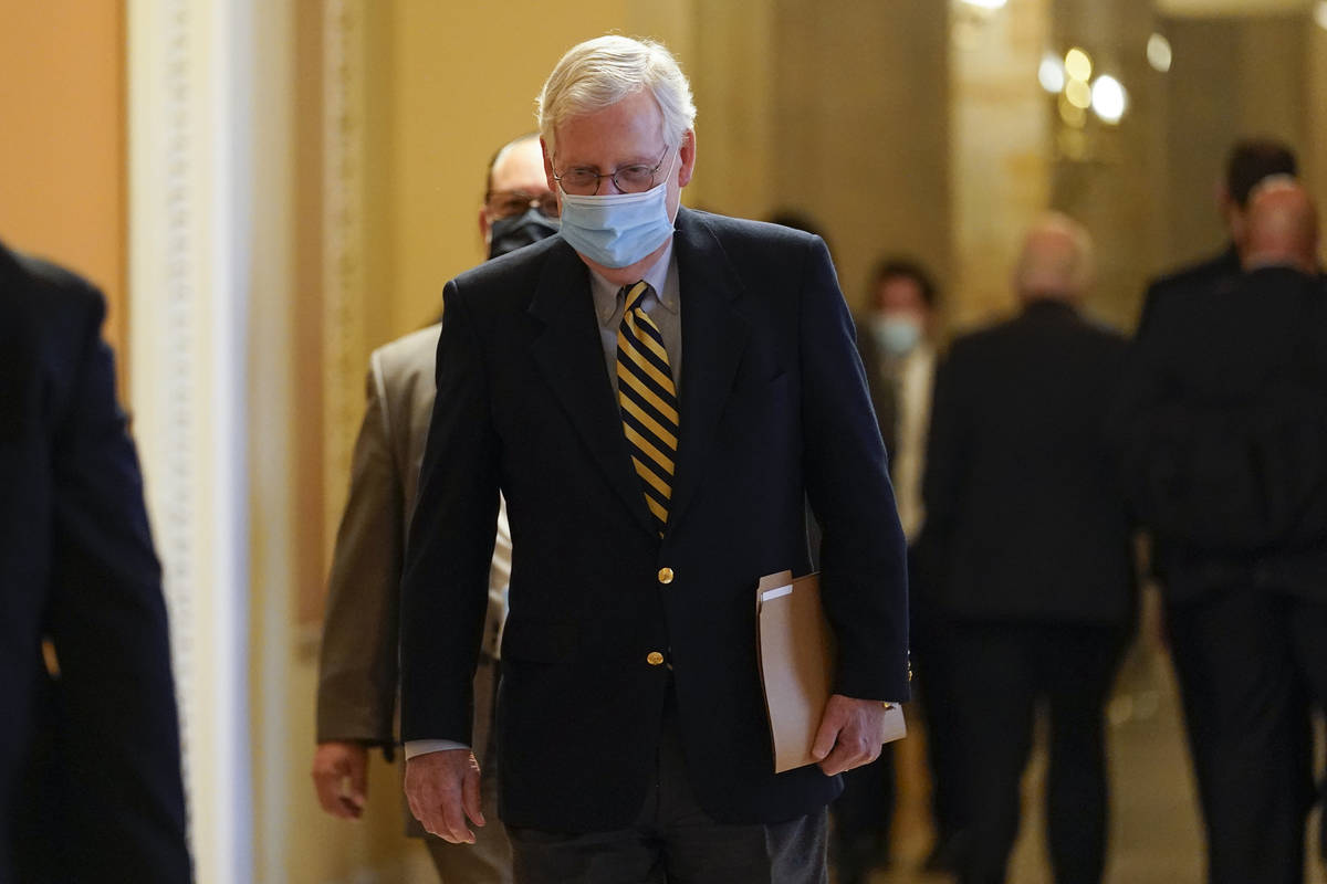 Senate Minority Leader Mitch McConnell of Ky., walks to speak on the Senate floor on Capitol Hi ...