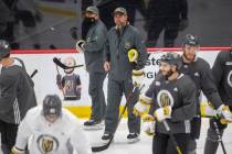 Vegas Golden Knights head coach Pete DeBoer looks on as the team disperses from a meeting on th ...