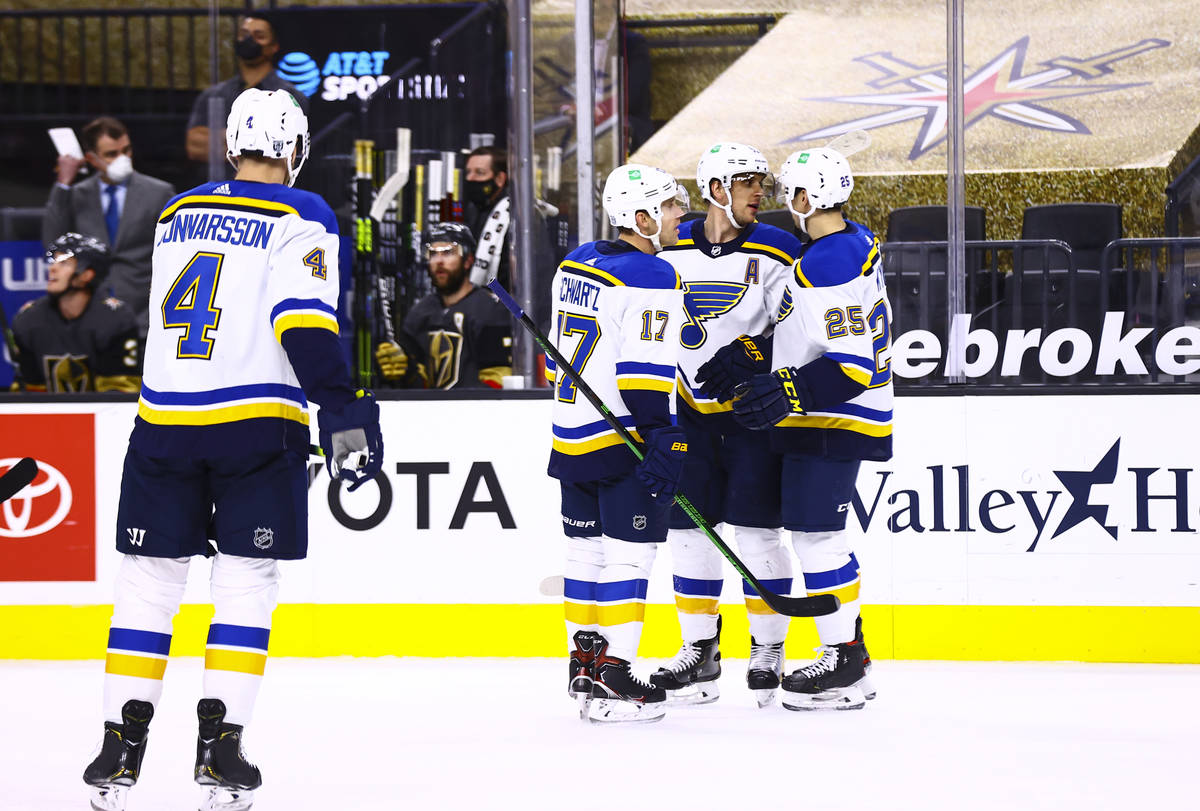 The St. Louis Blues celebrate after scoring against the Golden Knights during the first period ...