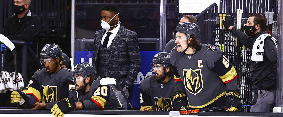 Golden Knights right wing Mark Stone (61) shouts from the bench during the second period of an ...