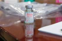 The North Las Vegas Fire Department administrates its first batch of COVID-19 vaccines to first ...