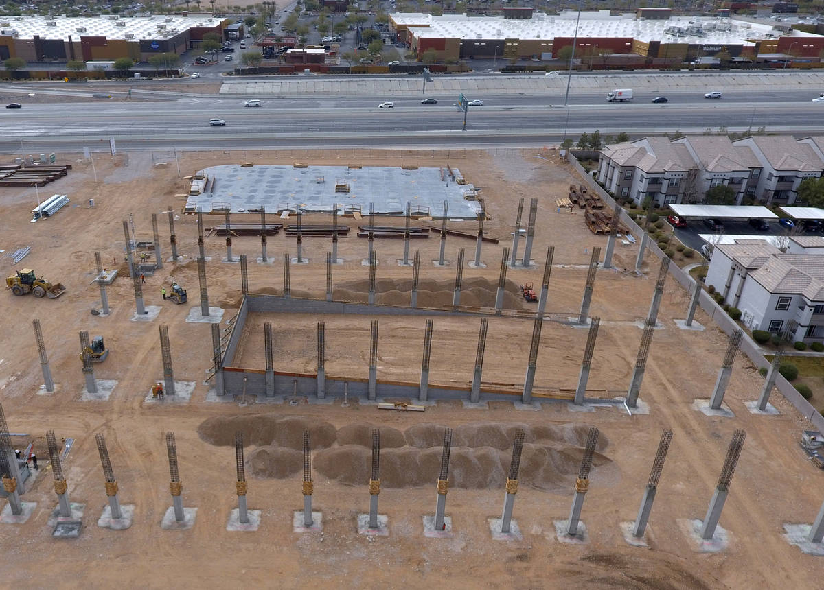 Interstate 215 is seen from this aerial view of the construction site of Axiom, an office compl ...