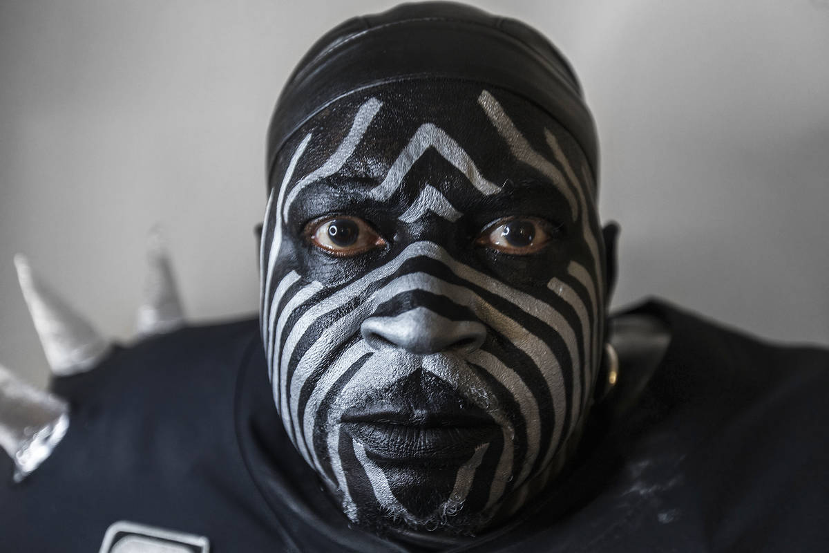 Raiders super fan Wayne Mabry, known as "Violator," in his hotel room at 4 a.m. in Dublin, Cali ...
