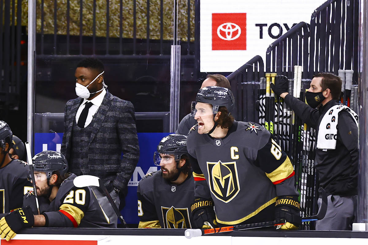 Golden Knights right wing Mark Stone (61) shouts from the bench during the second period of an ...