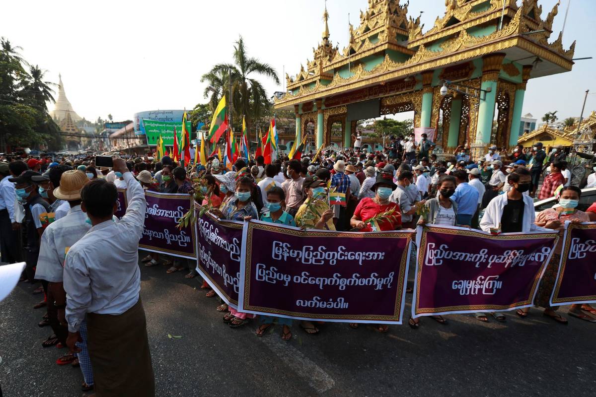 Supporters of the Myanmar military and the military-backed Union Solidarity and Development Par ...