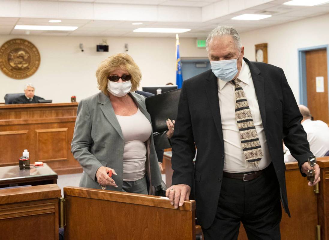 Patricia, left, and her husband Marcel Chappuis leave Beatty Justice Court after their hearing ...