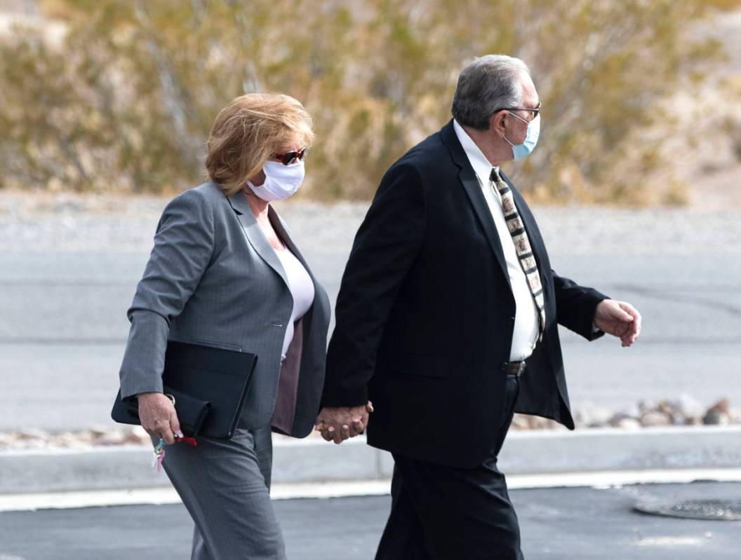 Patricia, left, and her husband Marcel Chappuis arrive at Beatty Justice Court for their hearin ...