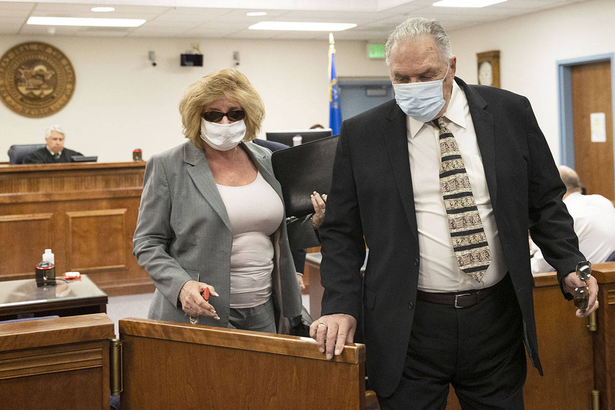 Patricia, left, and her husband Marcel Chappuis leave Beatty Justice Court after their hearing ...