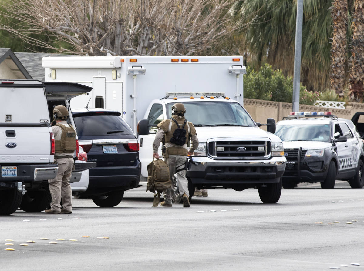 The Metropolitan Police Department investigates a barricade situation at McLeod Drive and Liber ...