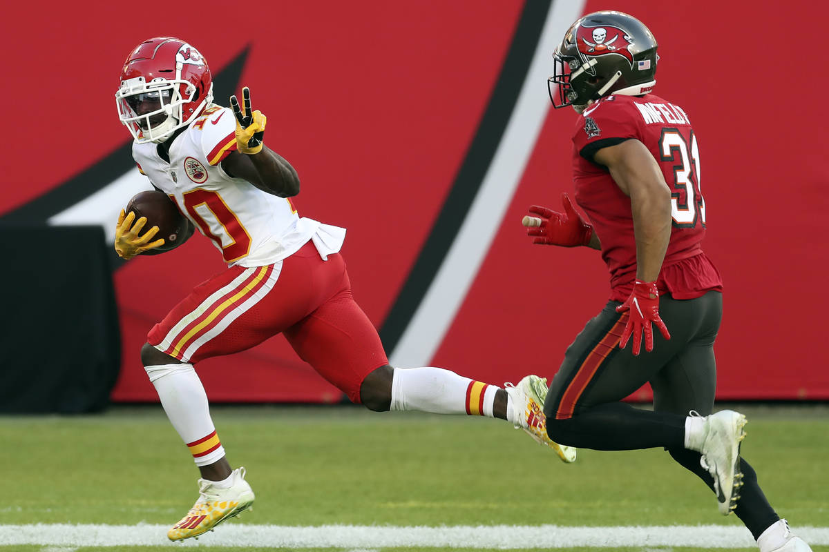 In this Nov. 29, 2020 file photo, Kansas City Chiefs wide receiver Tyreek Hill (10) reacts as h ...