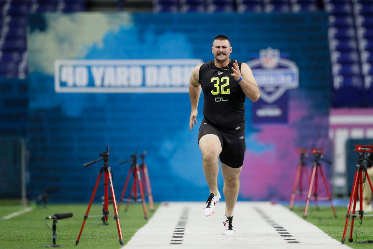 Boise State offensive lineman John Molchon runs the 40-yard dash at the NFL football scouting c ...