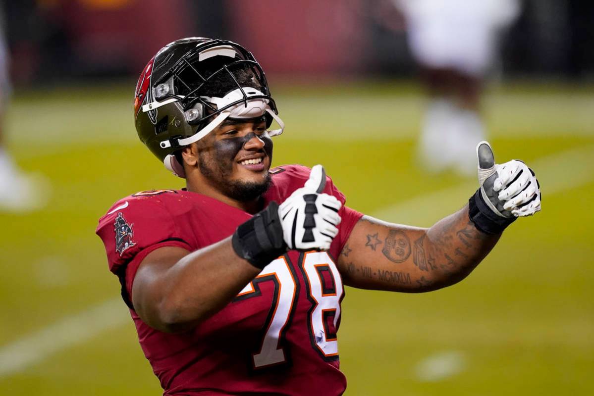 Tampa Bay Buccaneers offensive tackle Tristan Wirfs (78) gestures at the end of an NFL wild-car ...