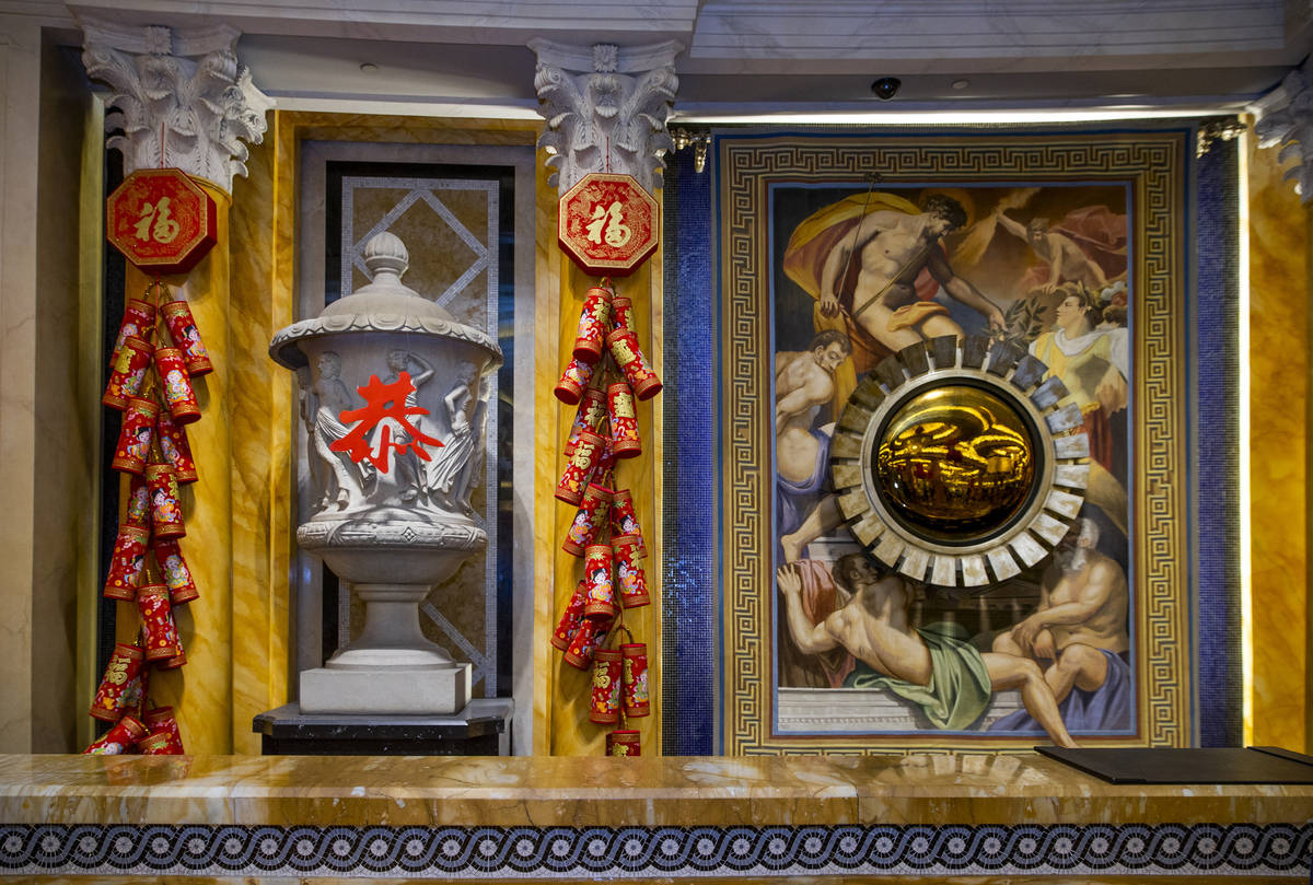 Fireworks and good luck symbols are hung in the main lobby as part of the decorations for the L ...