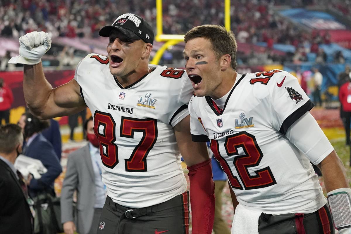 Tampa Bay Buccaneers tight end Rob Gronkowski, left, and quarterback Tom Brady celebrate after ...