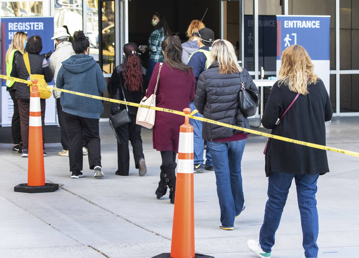 People lined up to get their second doses of vaccine at the Las Vegas Convention Center's vacci ...