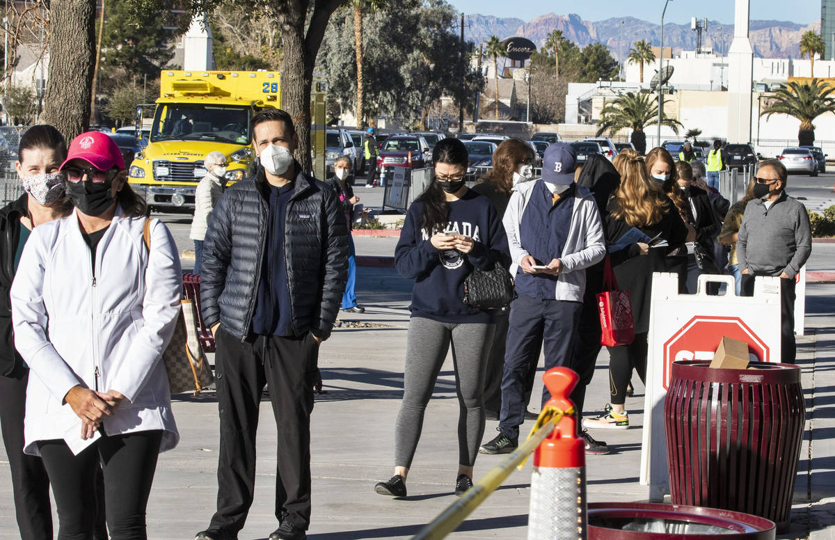 People lined up to get their second doses of vaccine at the Las Vegas Convention Center's vacci ...